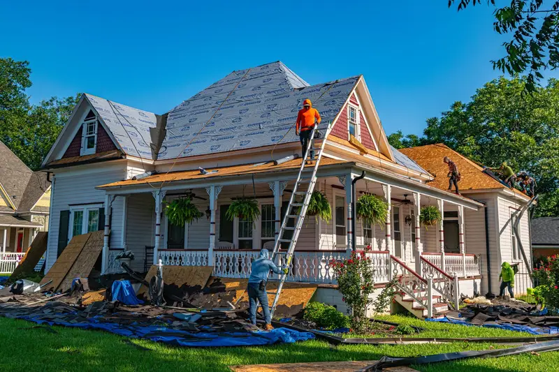 Older home stripped down to the roof decking during a replacement